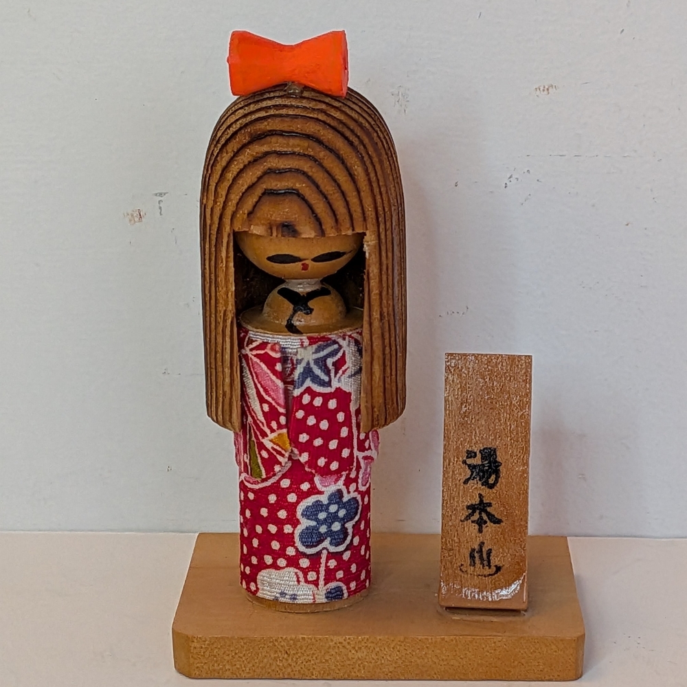 Miniature Wooden Japanese Kokeshi Doll with Red Fabric Kimono And Bow
